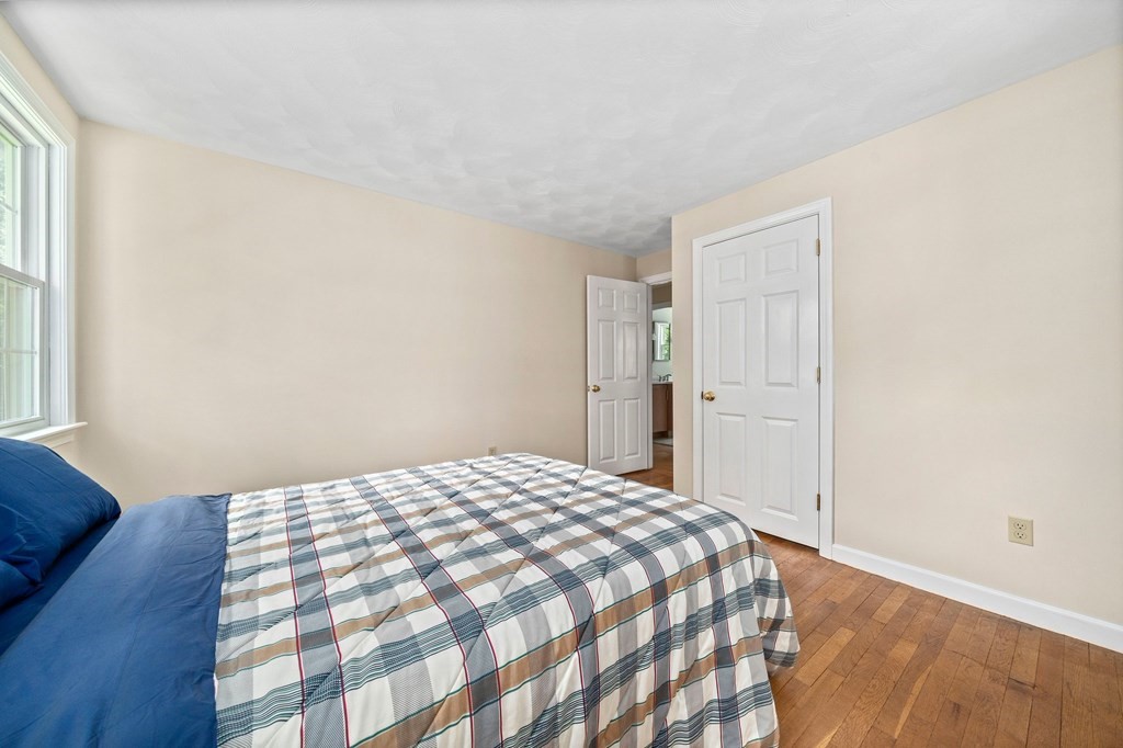 116 Meadowbrook Road Hanover, MA 02339 - Photo 27 of 41 a bedroom with a bed and a window