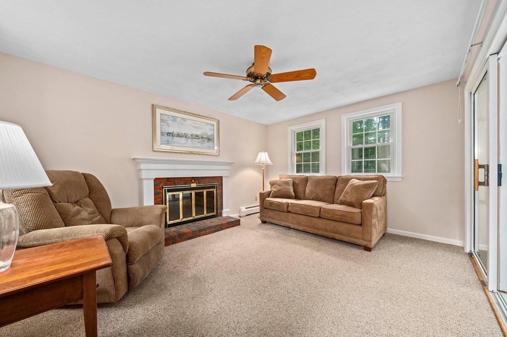 116 Meadowbrook Road Hanover, MA 02339 - Photo 5 of 41 a living room with furniture a ceiling fan and a window
