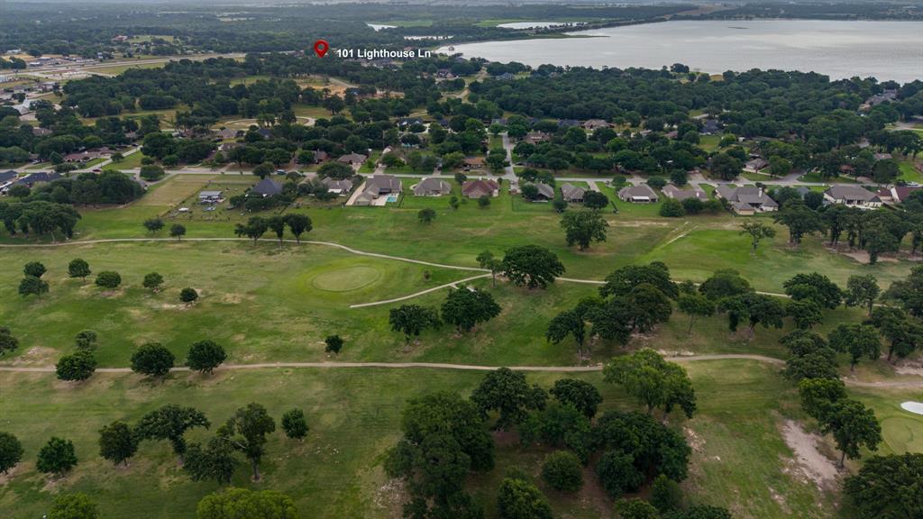 101 Lighthouse Lane Mabank, TX 75143 - Photo 36 of 40 Aerial perspective showcasing residential properties bordering a golf course