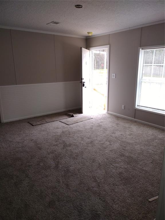 13144 Southwest 18th Street Road Ocala, FL 34481 - Photo 17 of 20 an empty room with windows