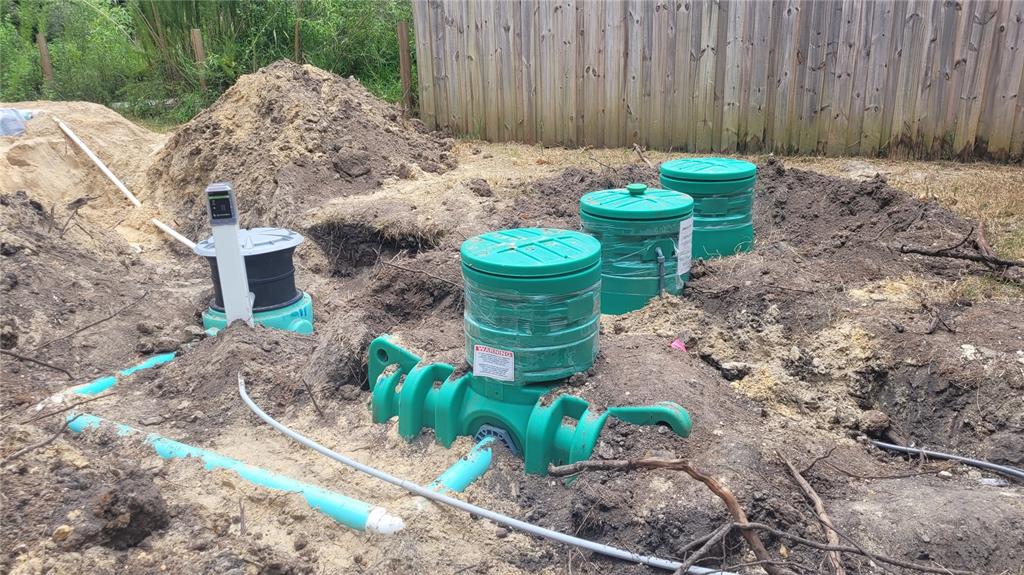 13144 Southwest 18th Street Road Ocala, FL 34481 - Photo 19 of 20 a view of a backyard with plants and chairs