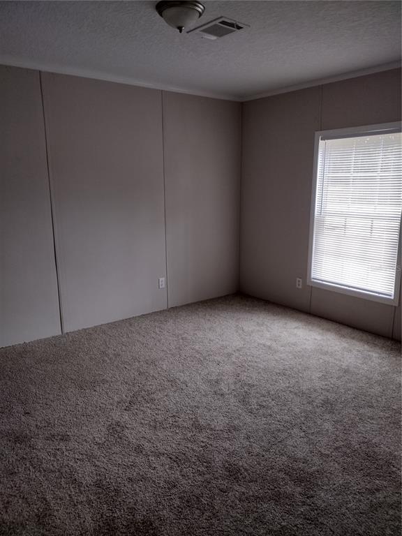 13144 Southwest 18th Street Road Ocala, FL 34481 - Photo 5 of 20 a view of an empty room with a window