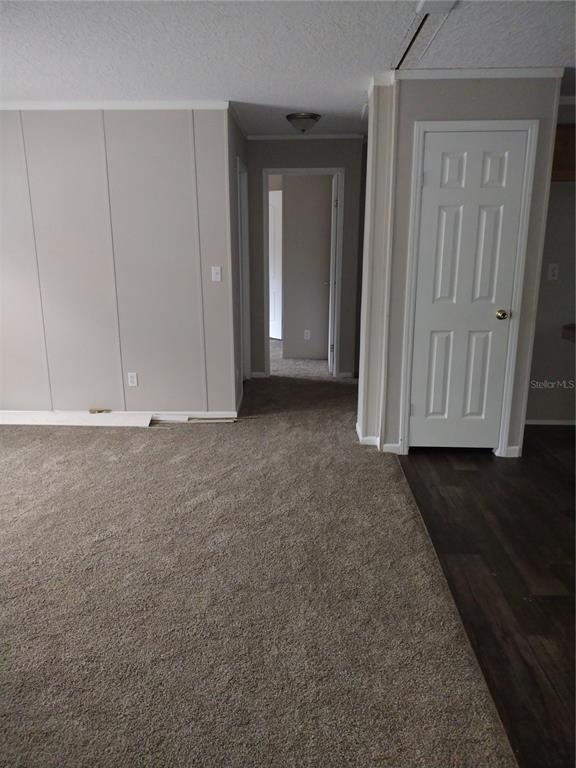 13144 Southwest 18th Street Road Ocala, FL 34481 - Photo 8 of 20 a view of room with wooden floor