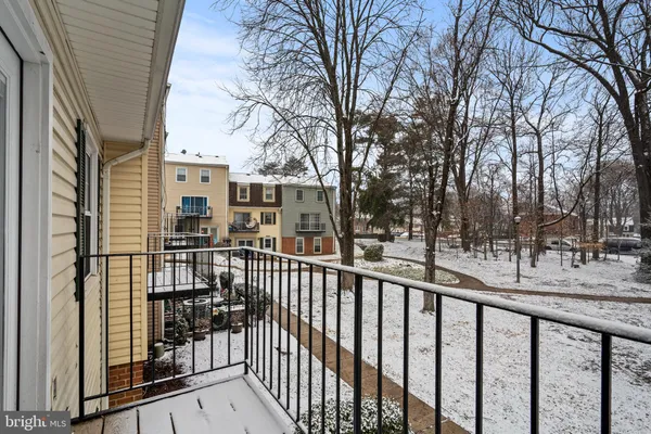 a view of a wooden house with a large window