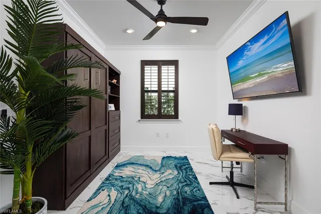 a bedroom with double bed and a large window