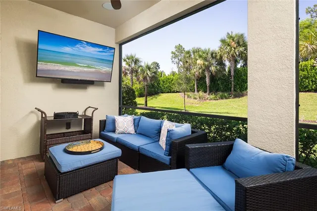 a view of a backyard with swimming pool