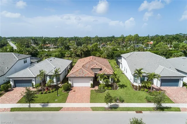 a view of swimming pool with chairs