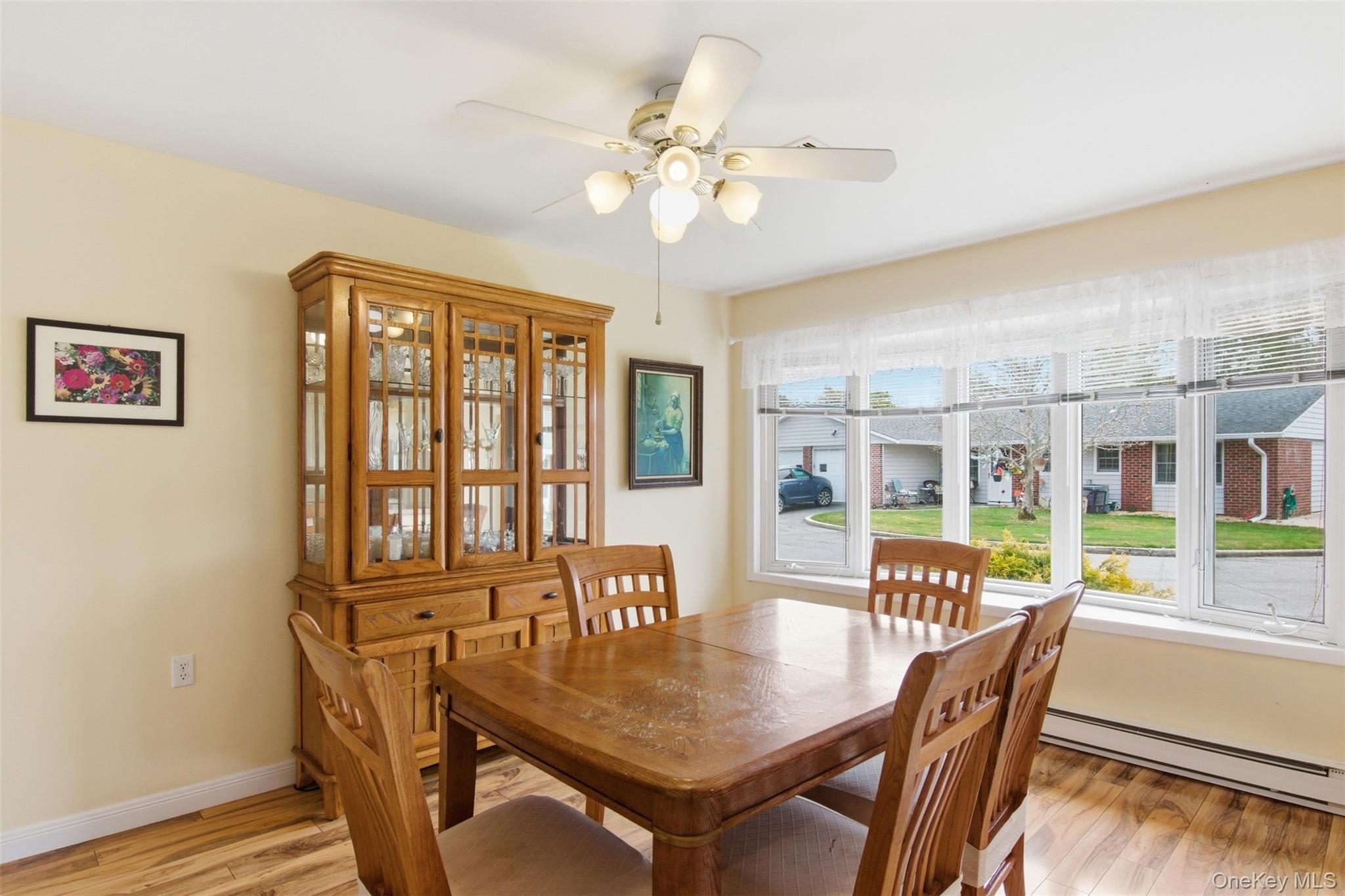 150 Eastbourne Court, Unit B Ridge, NY 11961 - Photo 13 of 33 Beautiful natural light and spacious dining room