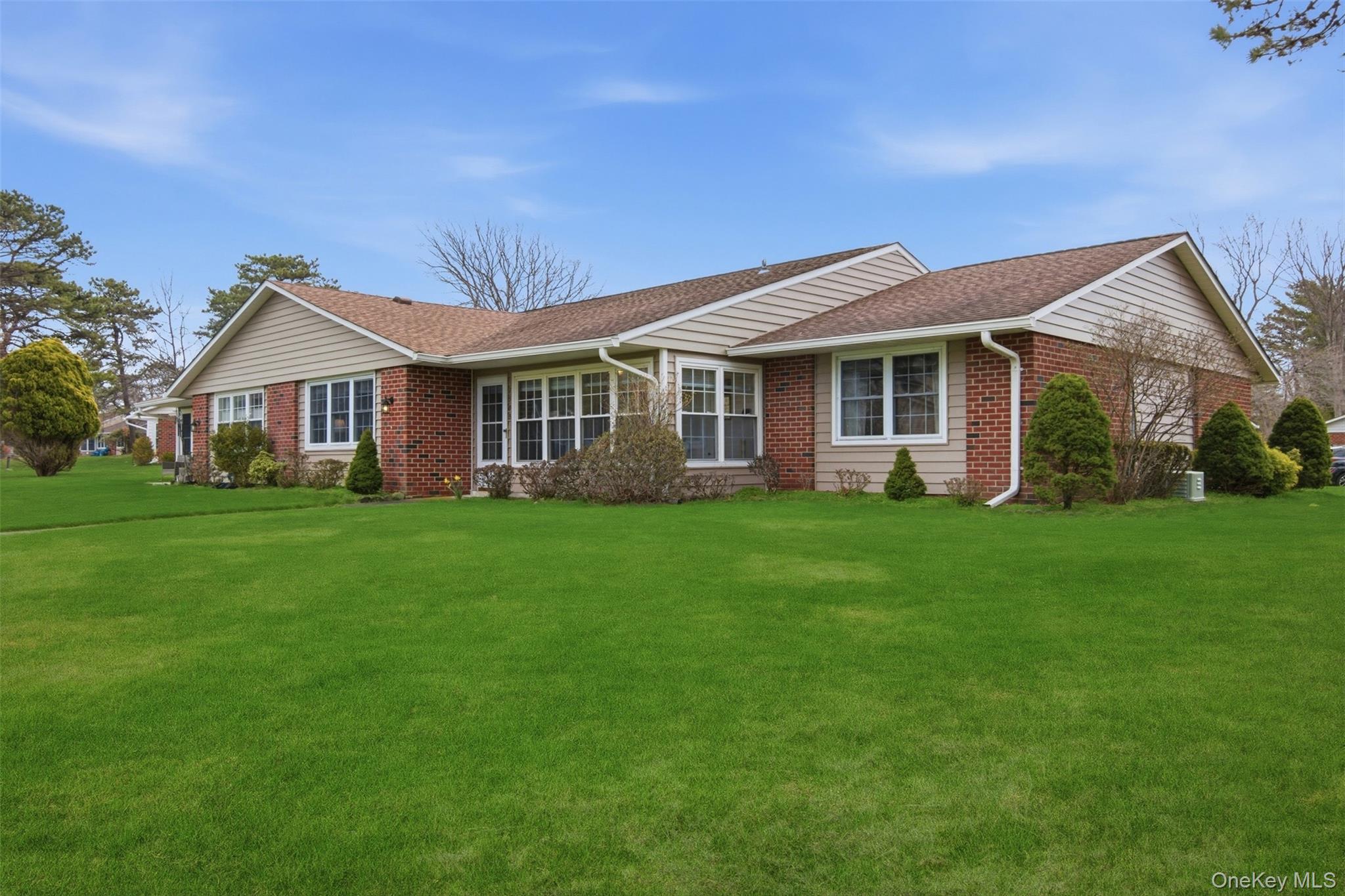 150 Eastbourne Court, Unit B Ridge, NY 11961 - Photo 24 of 33 back yard