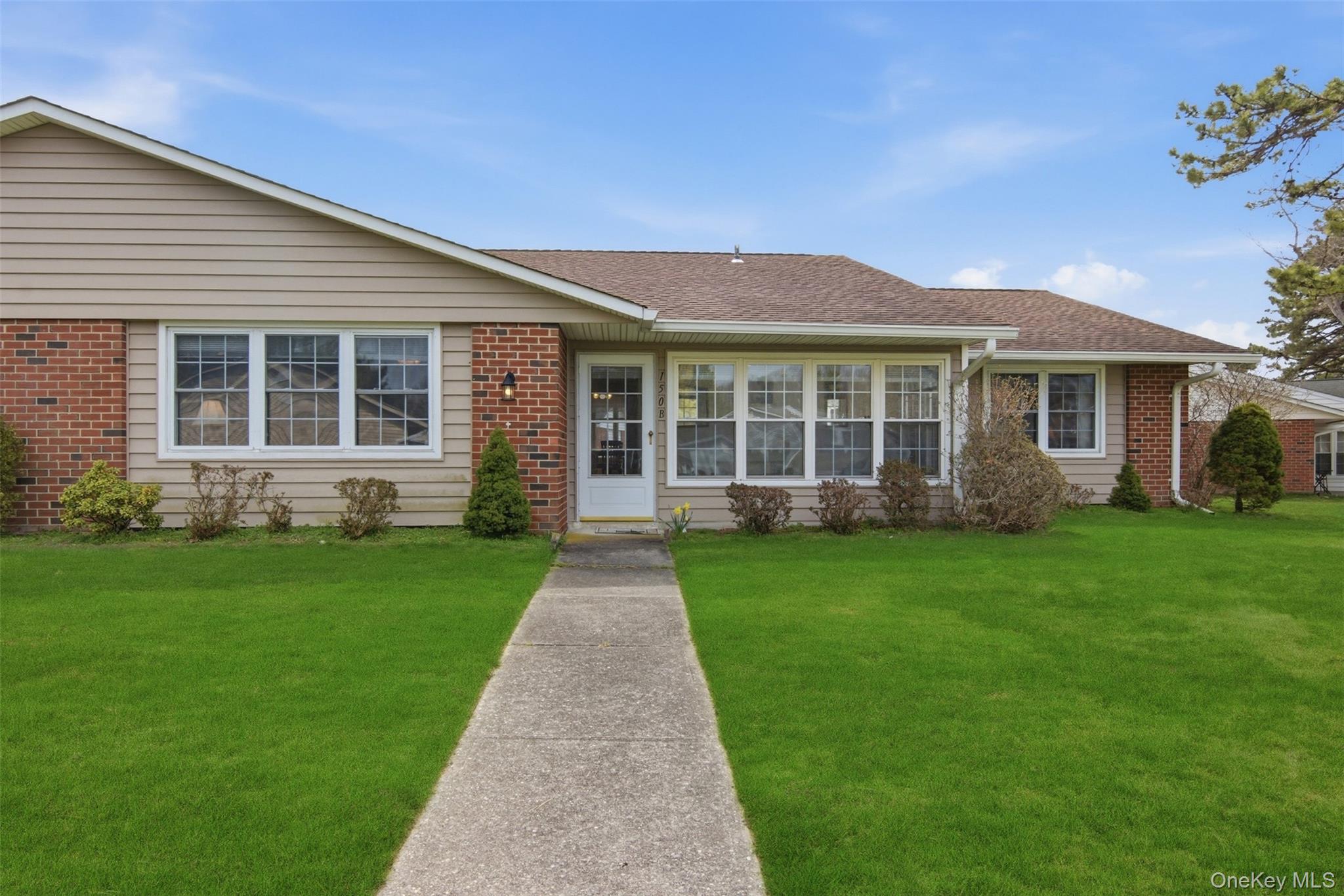150 Eastbourne Court, Unit B Ridge, NY 11961 - Photo 26 of 33 back door walk way