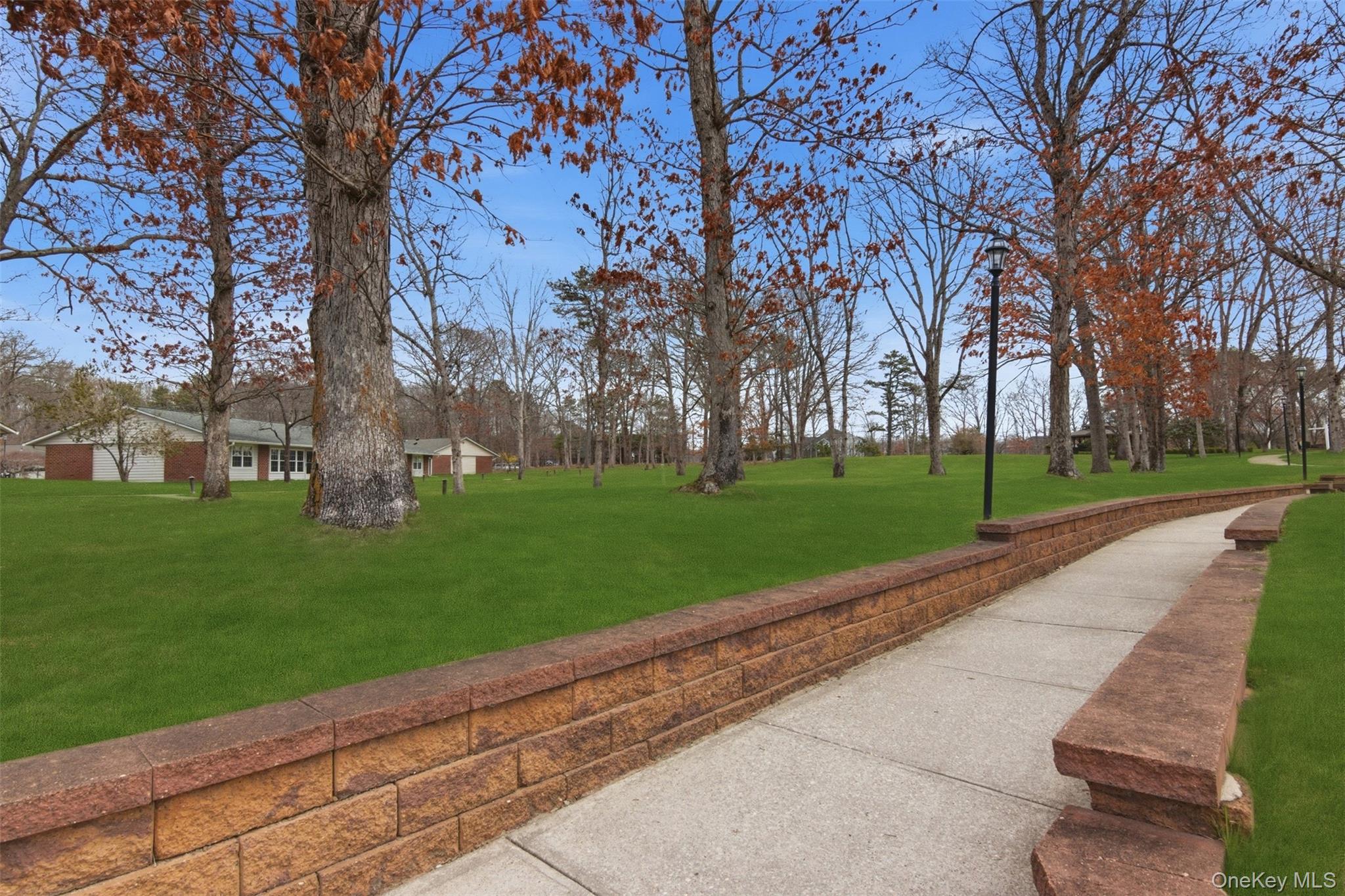150 Eastbourne Court, Unit B Ridge, NY 11961 - Photo 29 of 33 Sidewalks for a stroll