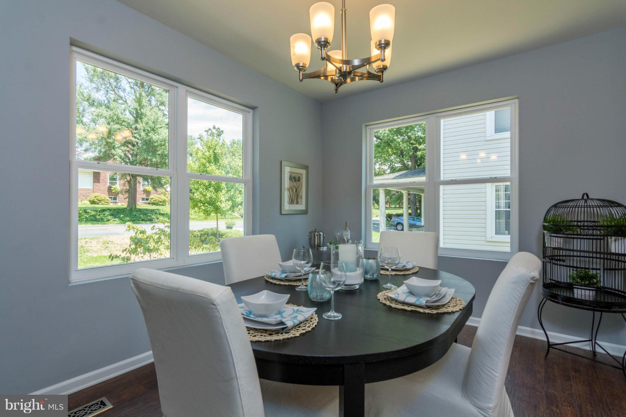 315 East Maple Road Linthicum Heights, MD 21090 - Photo 2 of 30 a view of a dining room with furniture window and outside view