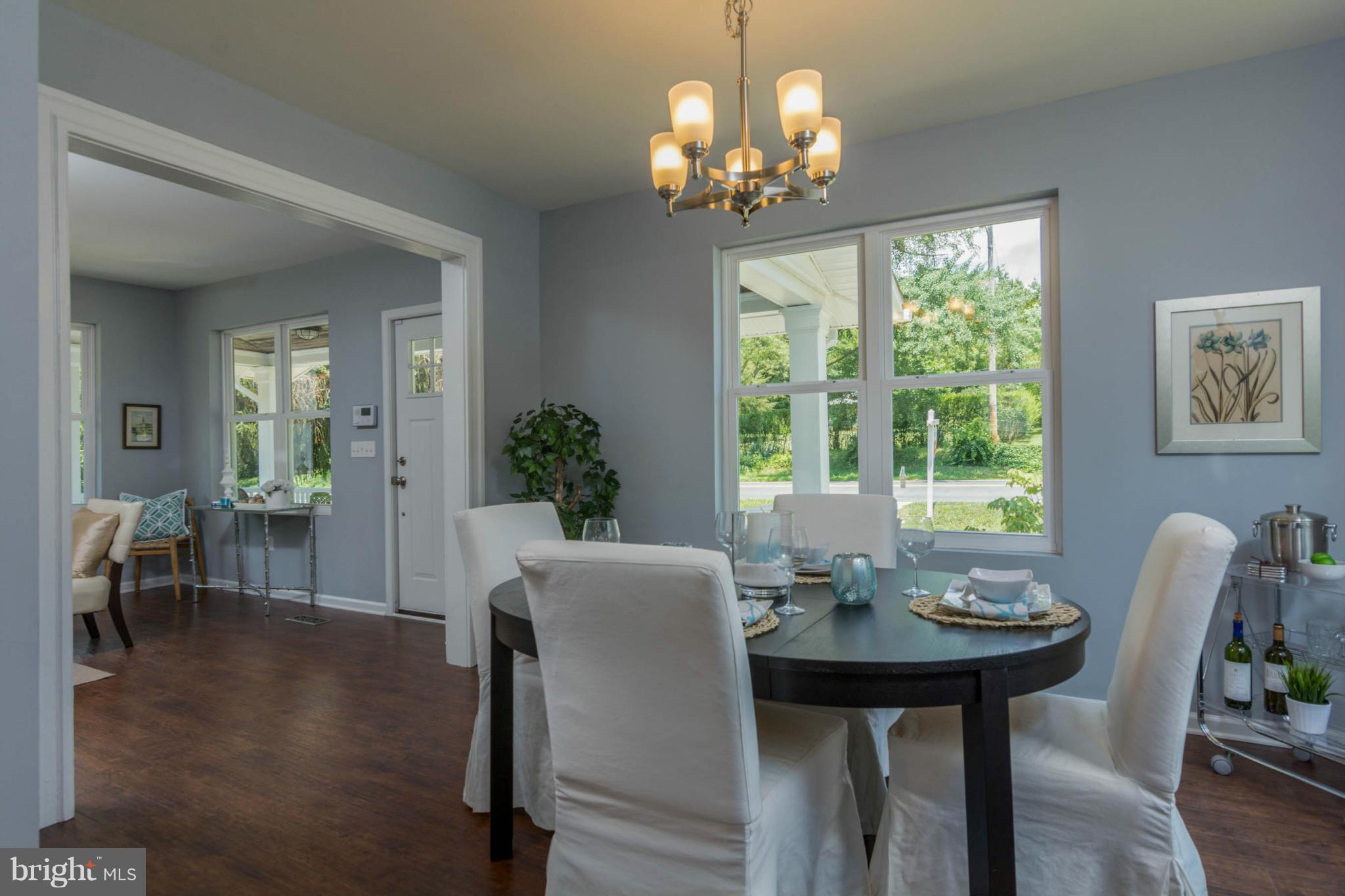 315 East Maple Road Linthicum Heights, MD 21090 - Photo 15 of 30 a view of a dining room with furniture window and wooden floor