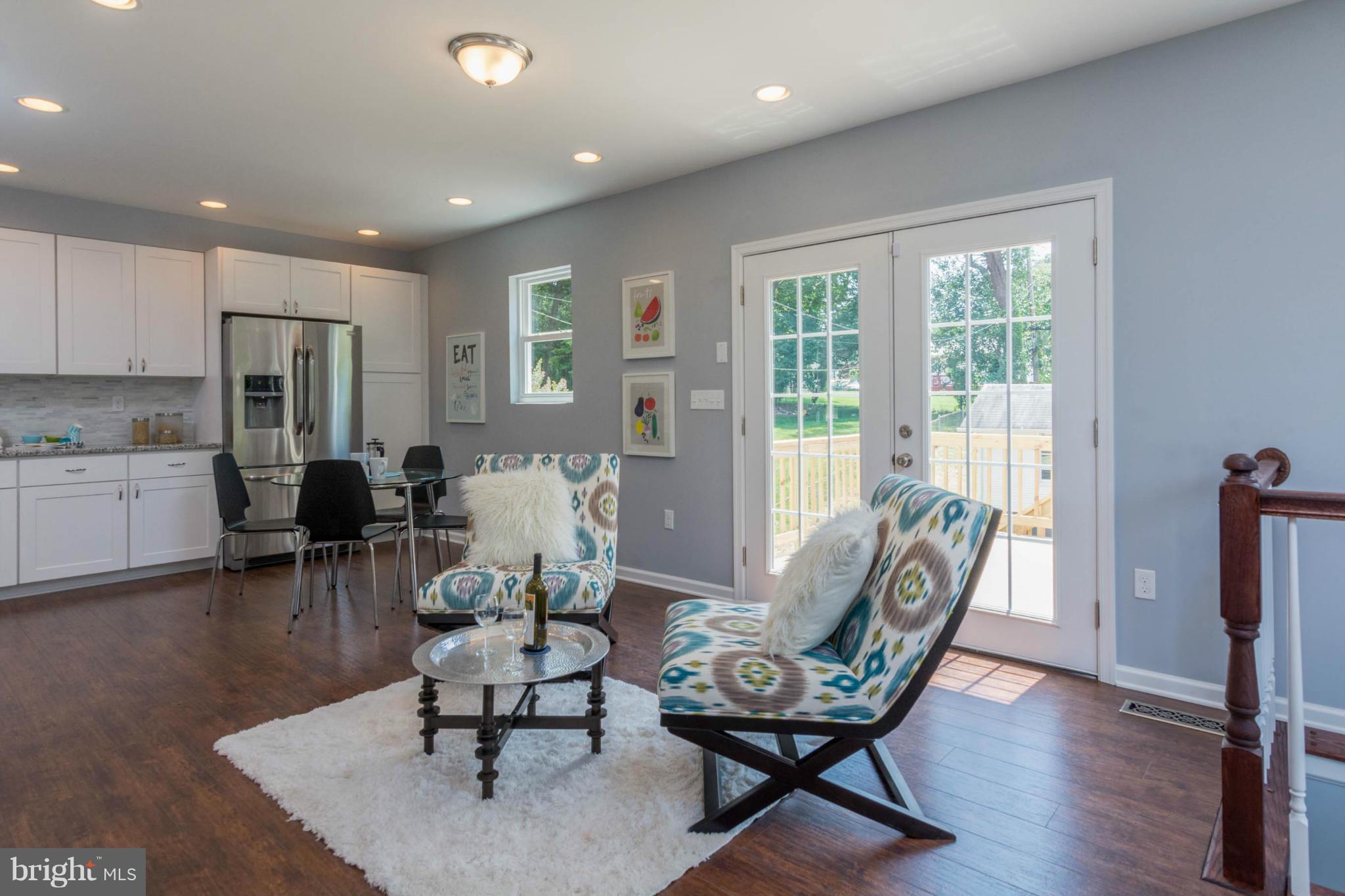 315 East Maple Road Linthicum Heights, MD 21090 - Photo 18 of 30 a living room with furniture and a large window