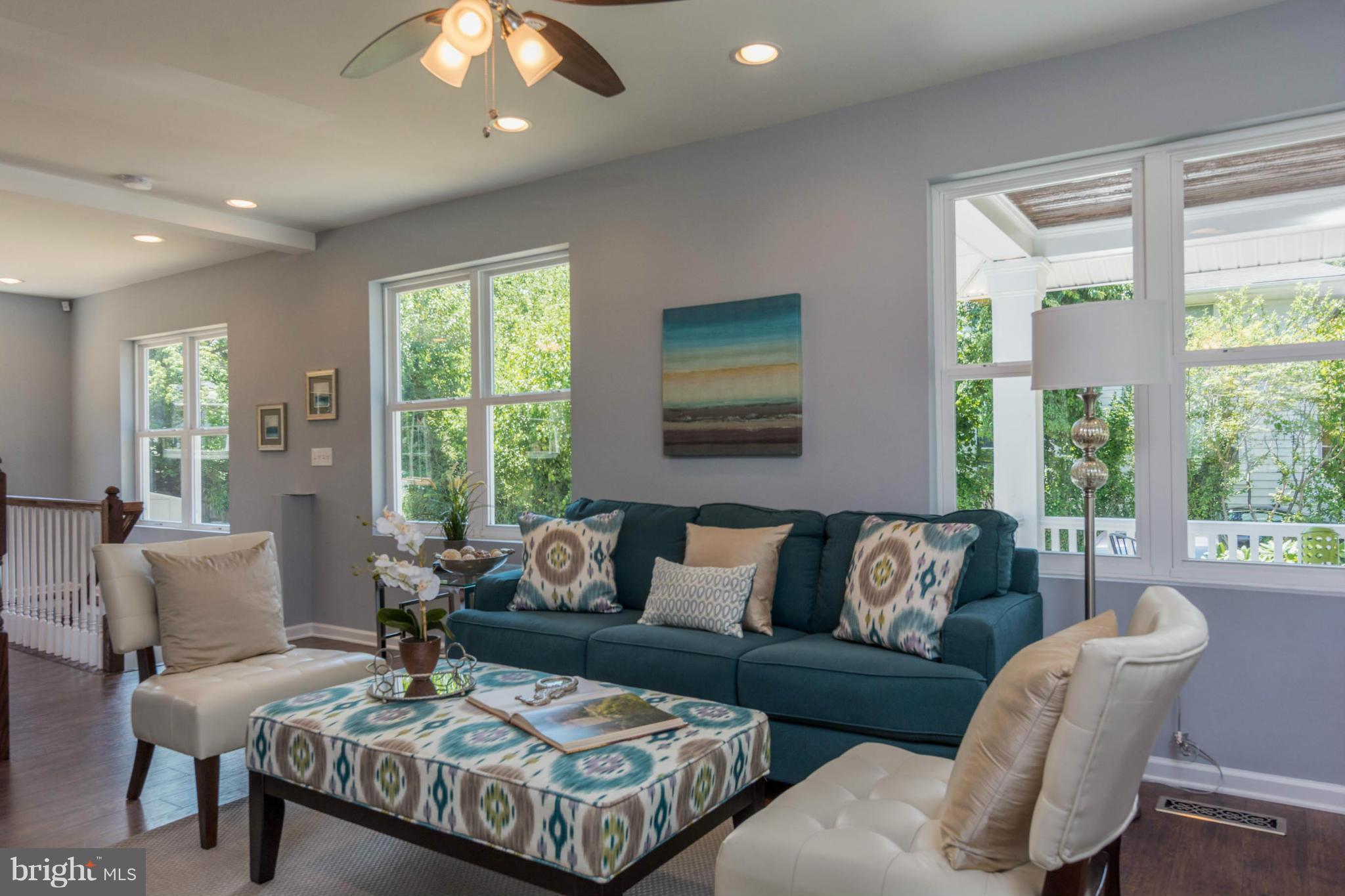 315 East Maple Road Linthicum Heights, MD 21090 - Photo 3 of 30 a living room with furniture and a large window