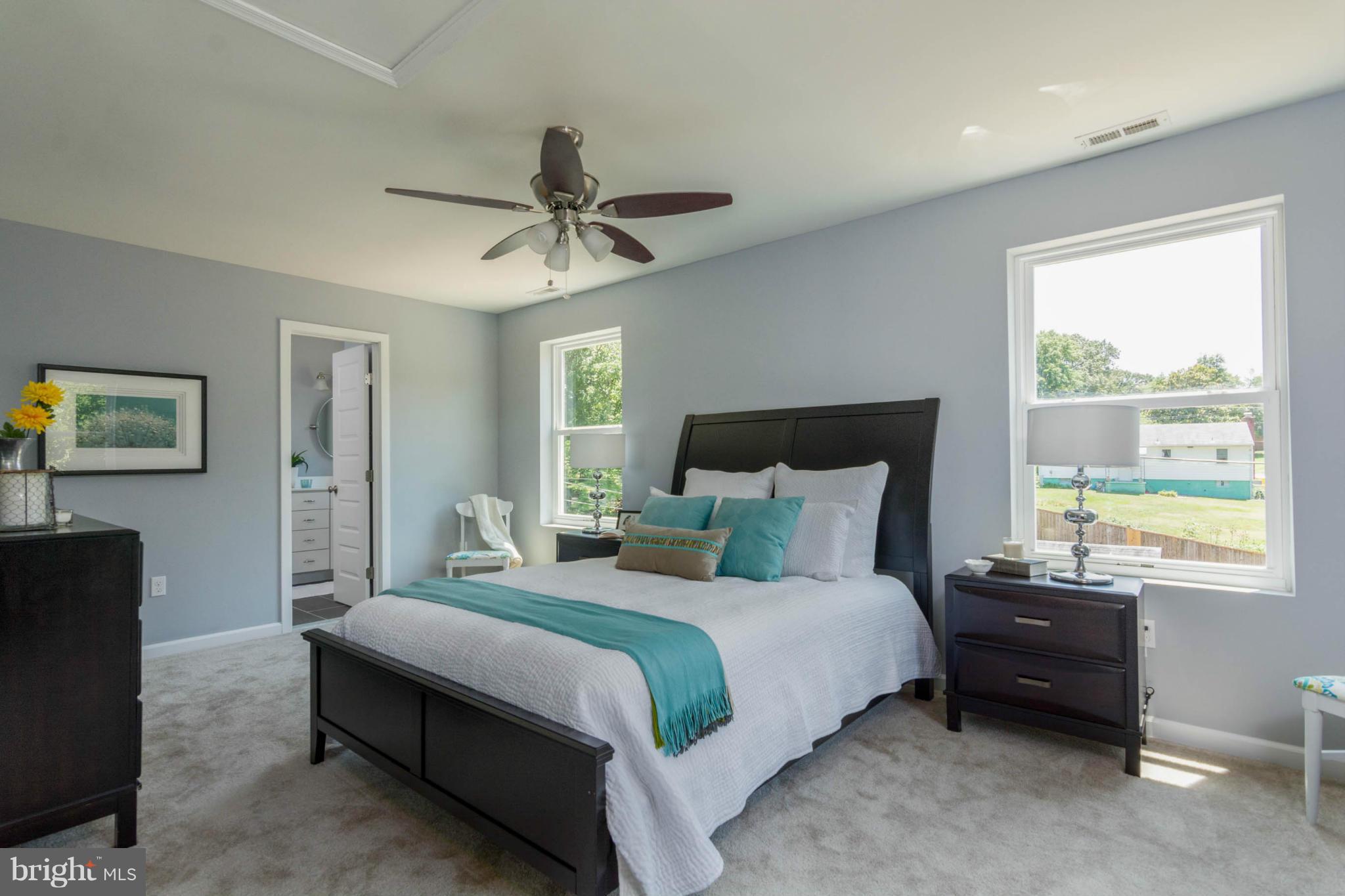 315 East Maple Road Linthicum Heights, MD 21090 - Photo 22 of 30 a bedroom with a bed and a window