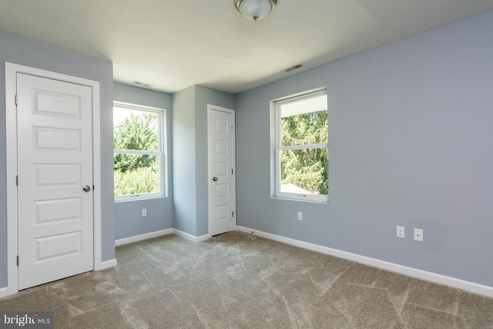 315 East Maple Road Linthicum Heights, MD 21090 - Photo 24 of 30 a view of room with window and hardwood floor