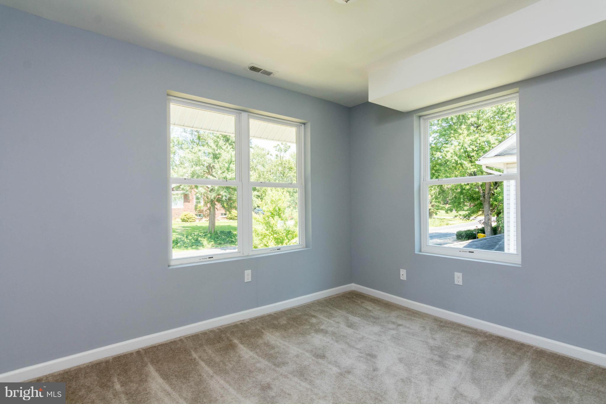 315 East Maple Road Linthicum Heights, MD 21090 - Photo 26 of 30 an empty room with windows