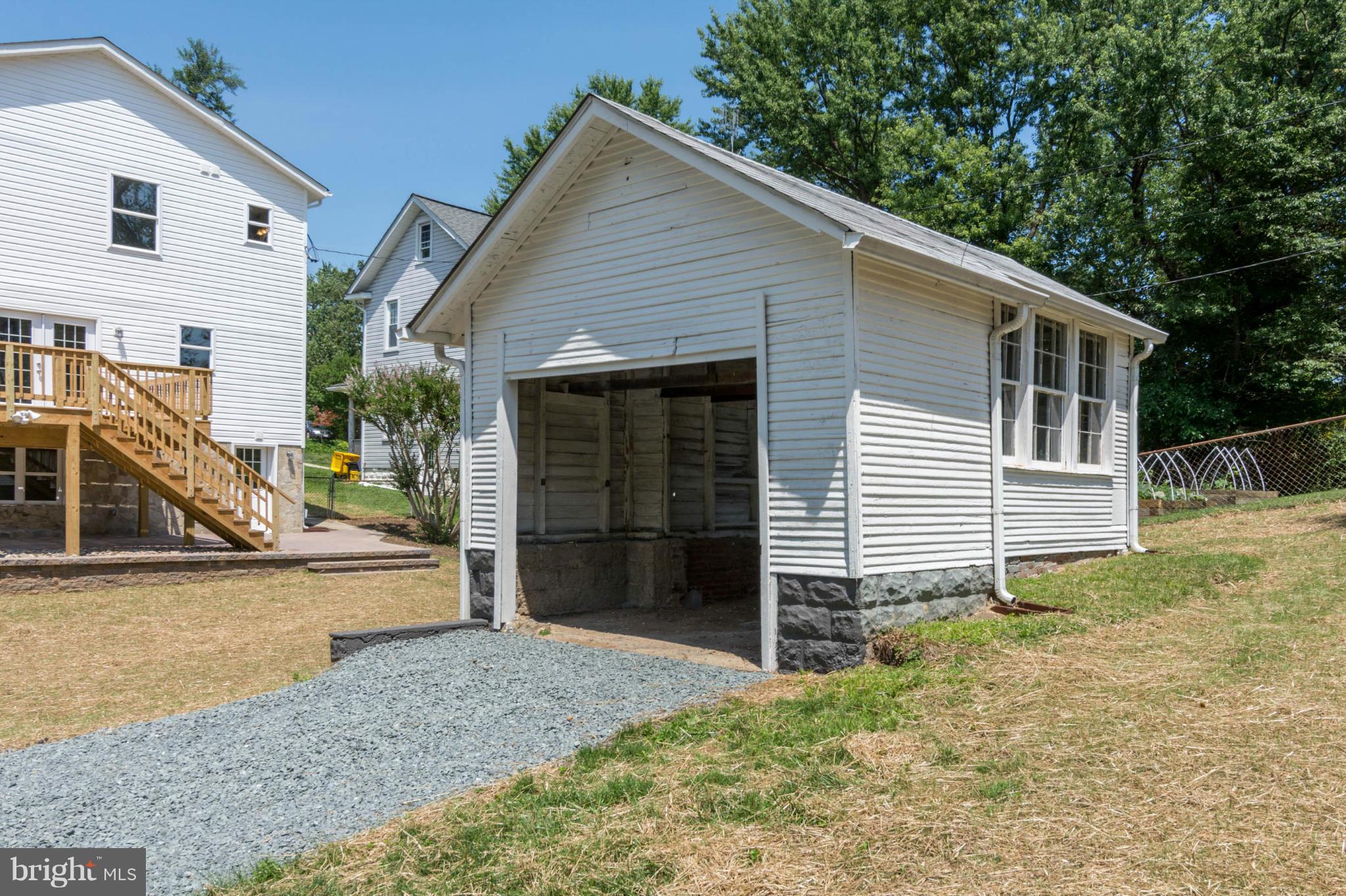 315 East Maple Road Linthicum Heights, MD 21090 - Photo 29 of 30 a view of a house with backyard and garden
