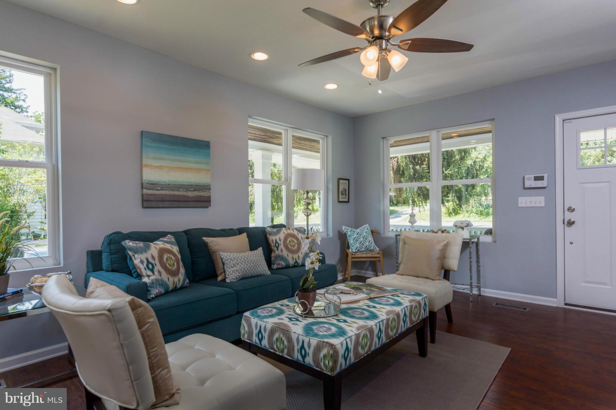 315 East Maple Road Linthicum Heights, MD 21090 - Photo 10 of 30 a living room with furniture and windows