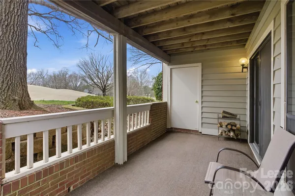 a view of a porch with furniture