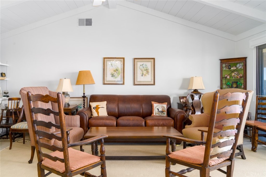 53 Goleta Point Drive Corona del Mar, CA 92625 - Photo 14 of 36 a bed room with a bed and a chair