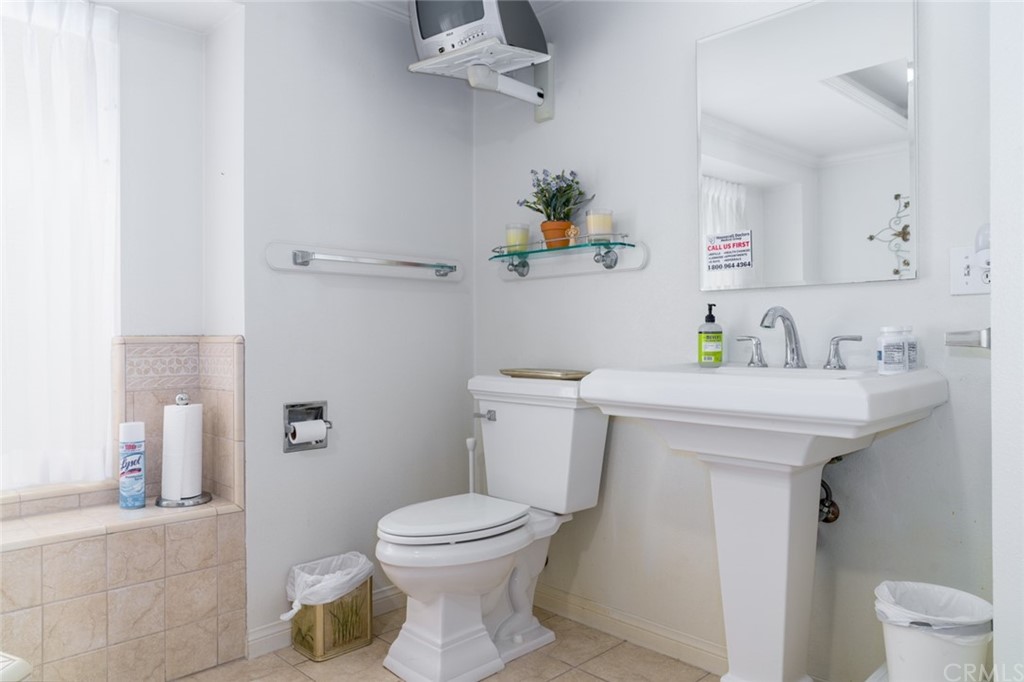 53 Goleta Point Drive Corona del Mar, CA 92625 - Photo 23 of 36 a view of a patio with two chairs and a table
