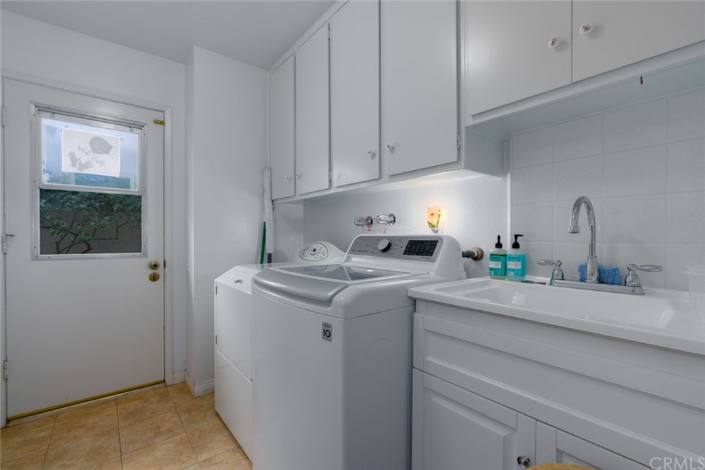 53 Goleta Point Drive Corona del Mar, CA 92625 - Photo 24 of 36 a view of a backyard with sitting area