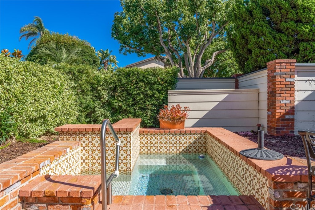 53 Goleta Point Drive Corona del Mar, CA 92625 - Photo 25 of 36 a view of a wooden deck with a yard