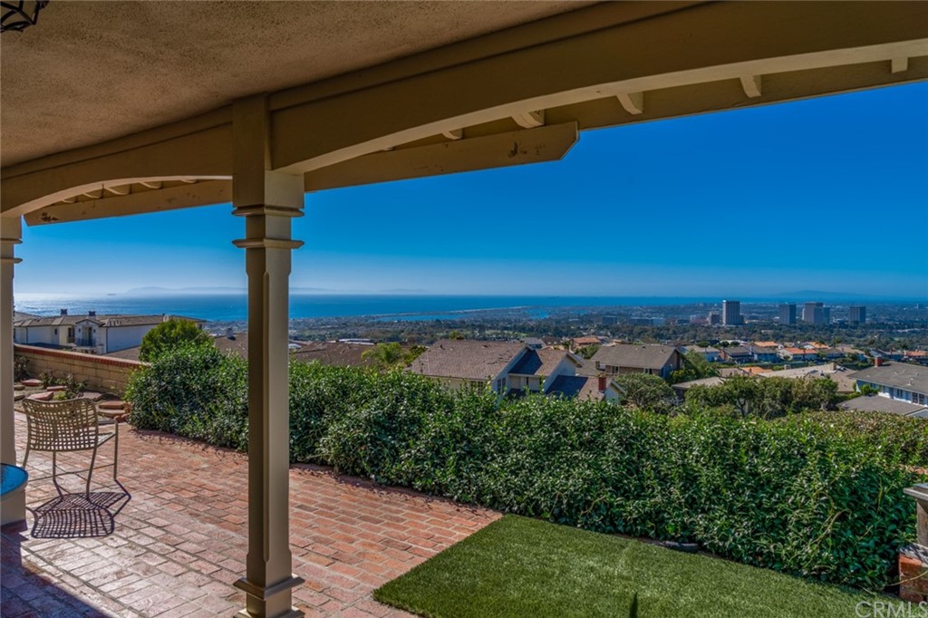 53 Goleta Point Drive Corona del Mar, CA 92625 - Photo 28 of 36 a front view of a house with a garden