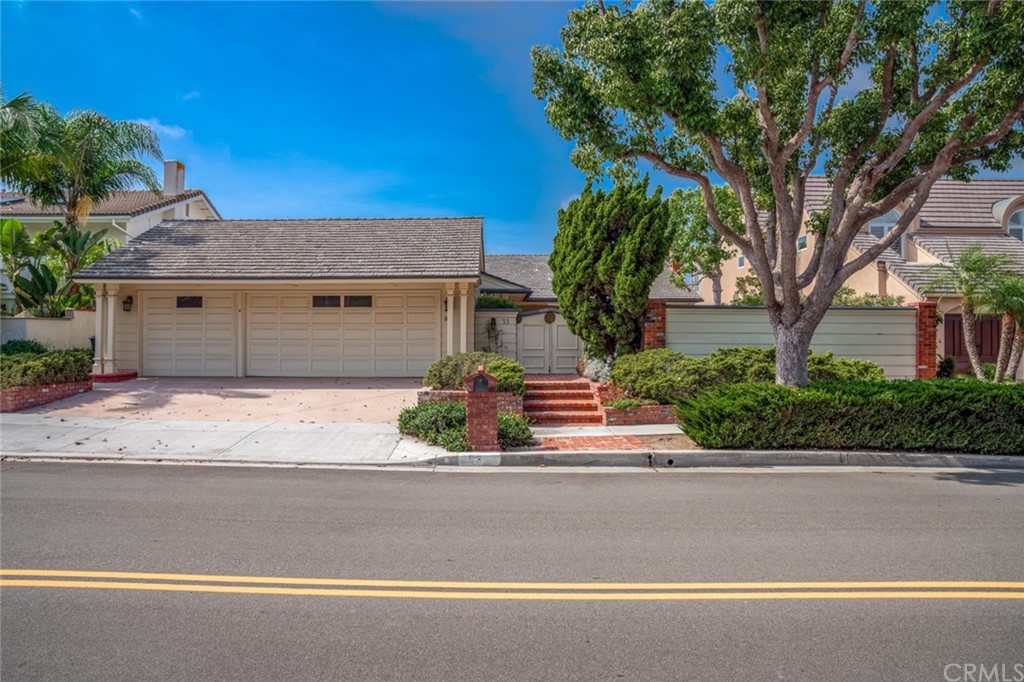 53 Goleta Point Drive Corona del Mar, CA 92625 - Photo 29 of 36 a view of a patio with table and chairs and potted plants