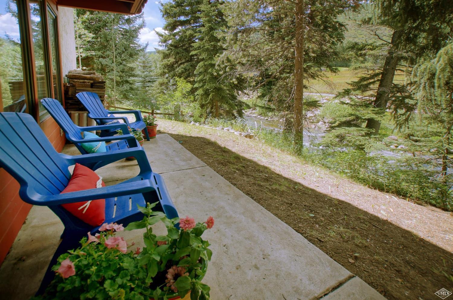 1763 Shasta Place Vail, CO 81657 - Photo 18 of 20 a view of a patio with chair and tables