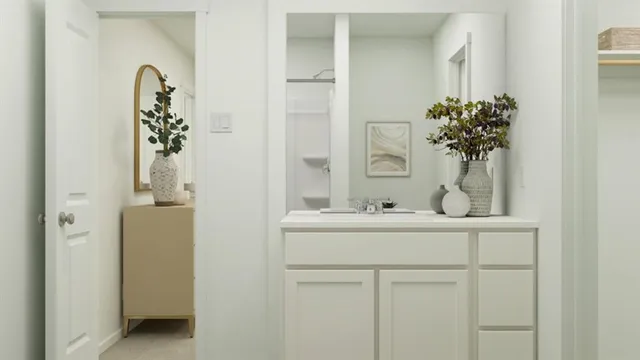a bathroom with a toilet and a shower curtain