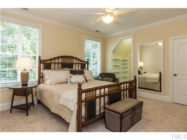 1913 Chase Court Raleigh, NC 27607 - Photo 15 of 25 This bedroom has its own study center, with bookcases and a built-in desk.