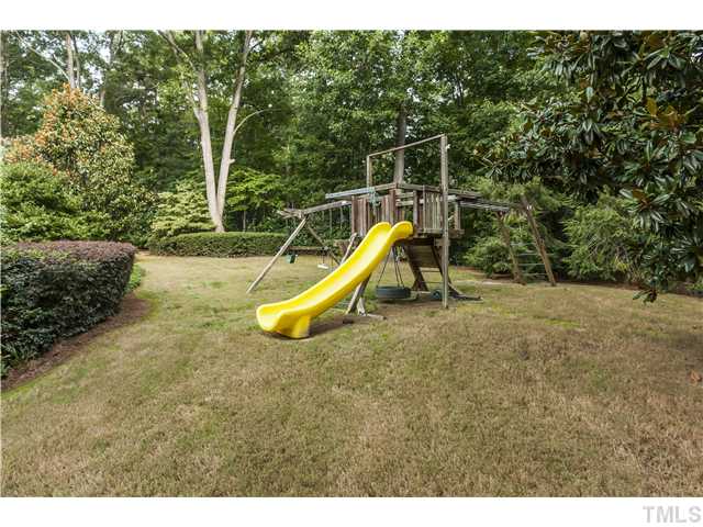 1913 Chase Court Raleigh, NC 27607 - Photo 19 of 25 ...more play space in the totally fenced-in yard with an automatic gate.