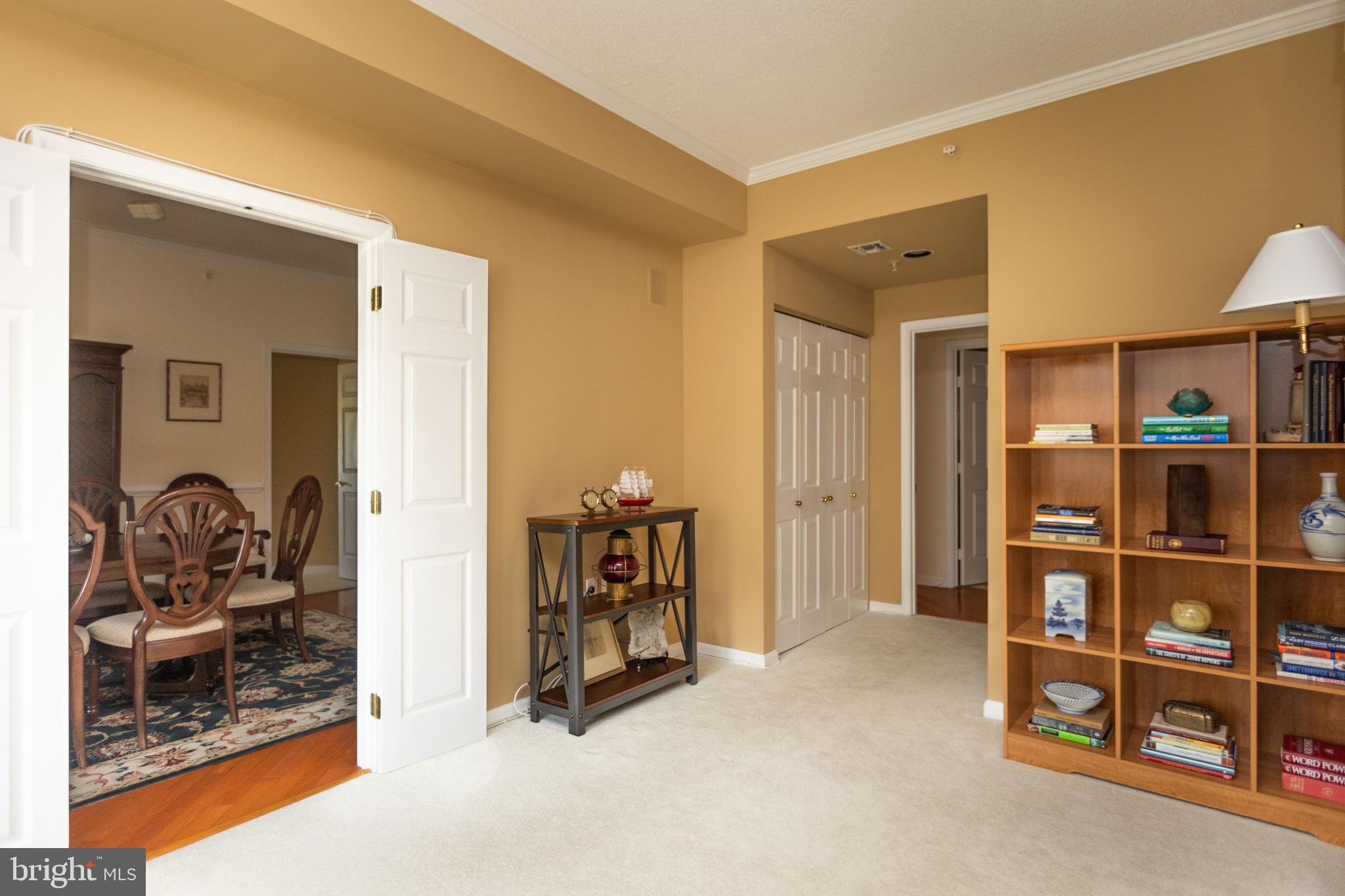 3801 Canterbury Road, Unit 816 Baltimore, MD 21218 - Photo 20 of 28 Bedroom 2 with dining room to the left