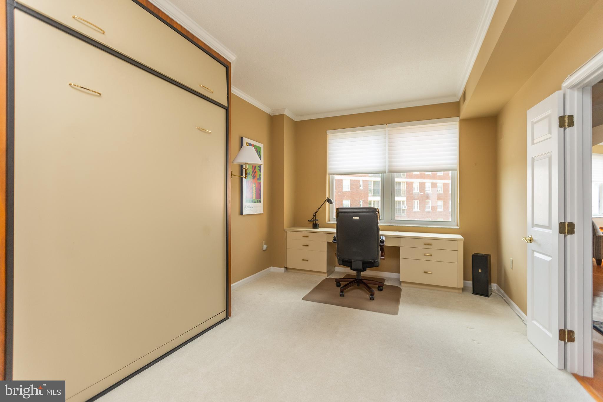 3801 Canterbury Road, Unit 816 Baltimore, MD 21218 - Photo 22 of 28 Bedroom 2 with murphy bed and built-in desk