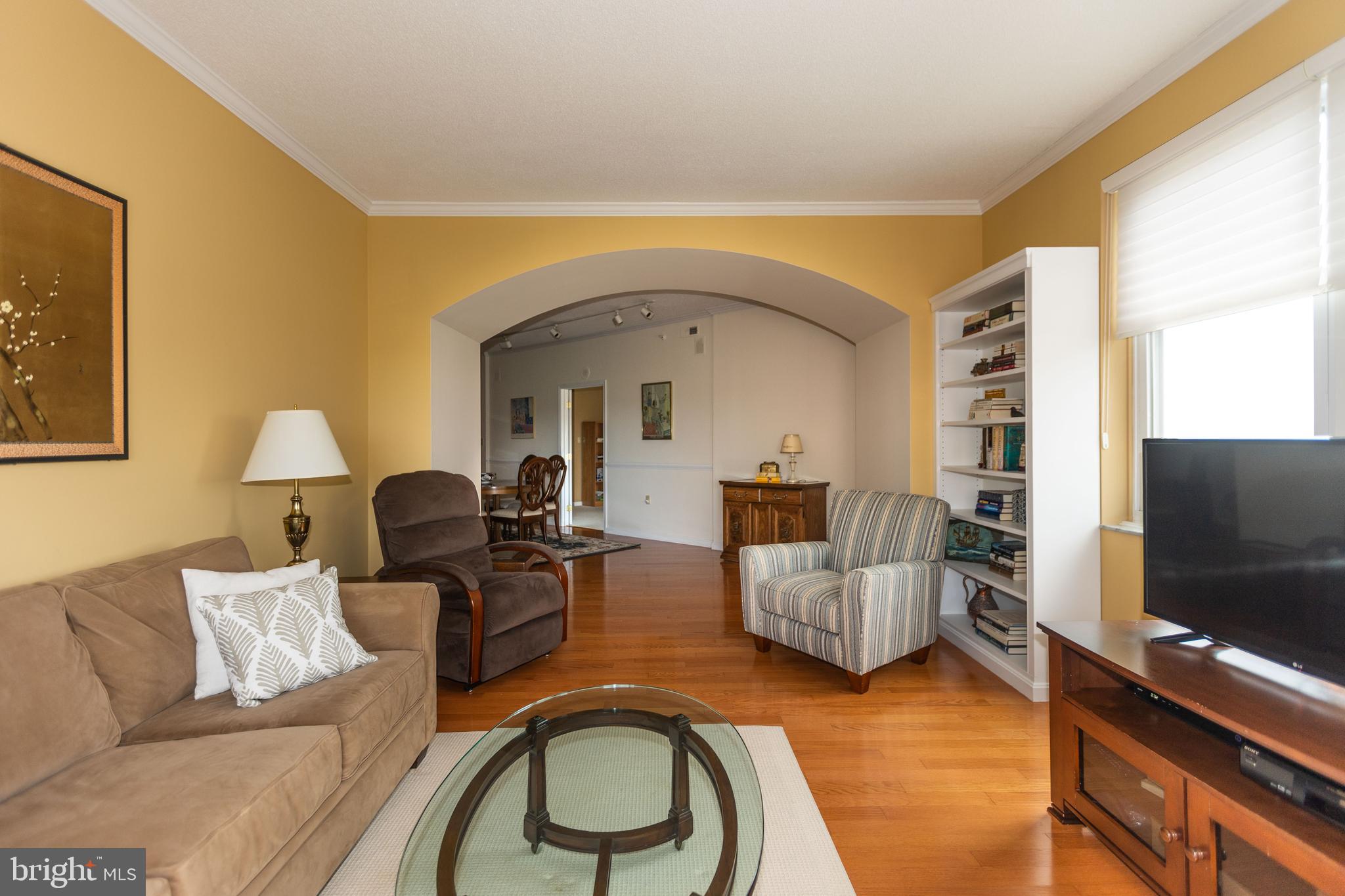 3801 Canterbury Road, Unit 816 Baltimore, MD 21218 - Photo 9 of 28 Living room view toward dining room