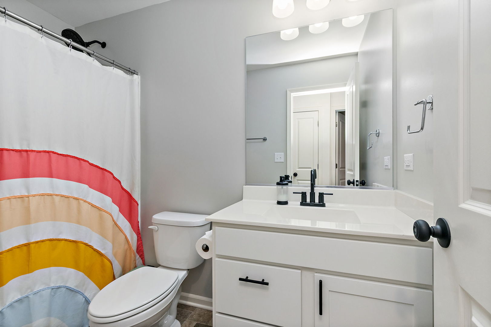 2563 BELLA Drive Pingree Grove, IL 60140 - Photo 21 of 38 a bathroom with a sink a toilet a mirror and shower curtain