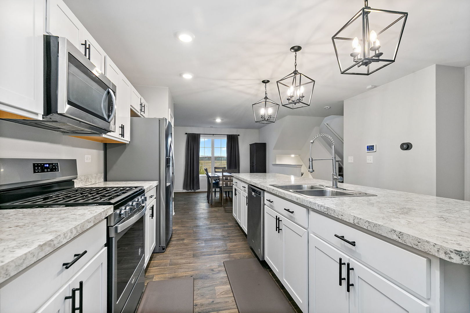 2563 BELLA Drive Pingree Grove, IL 60140 - Photo 7 of 38 a large kitchen with stainless steel appliances granite countertop a lot of counter space