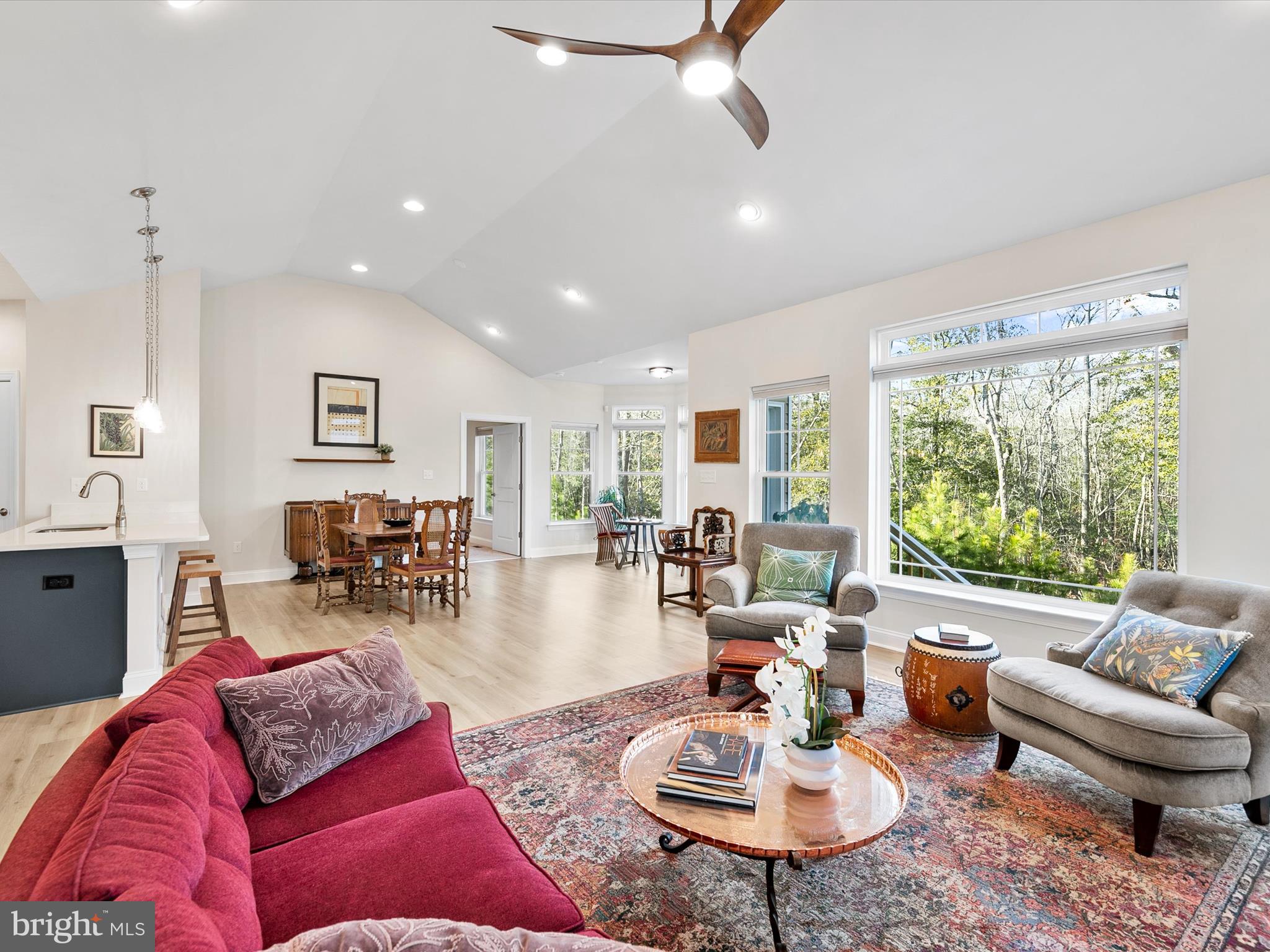 22657 Deep Woods Road Milton, DE 19968 - Photo 14 of 51 a living room with furniture and a large window