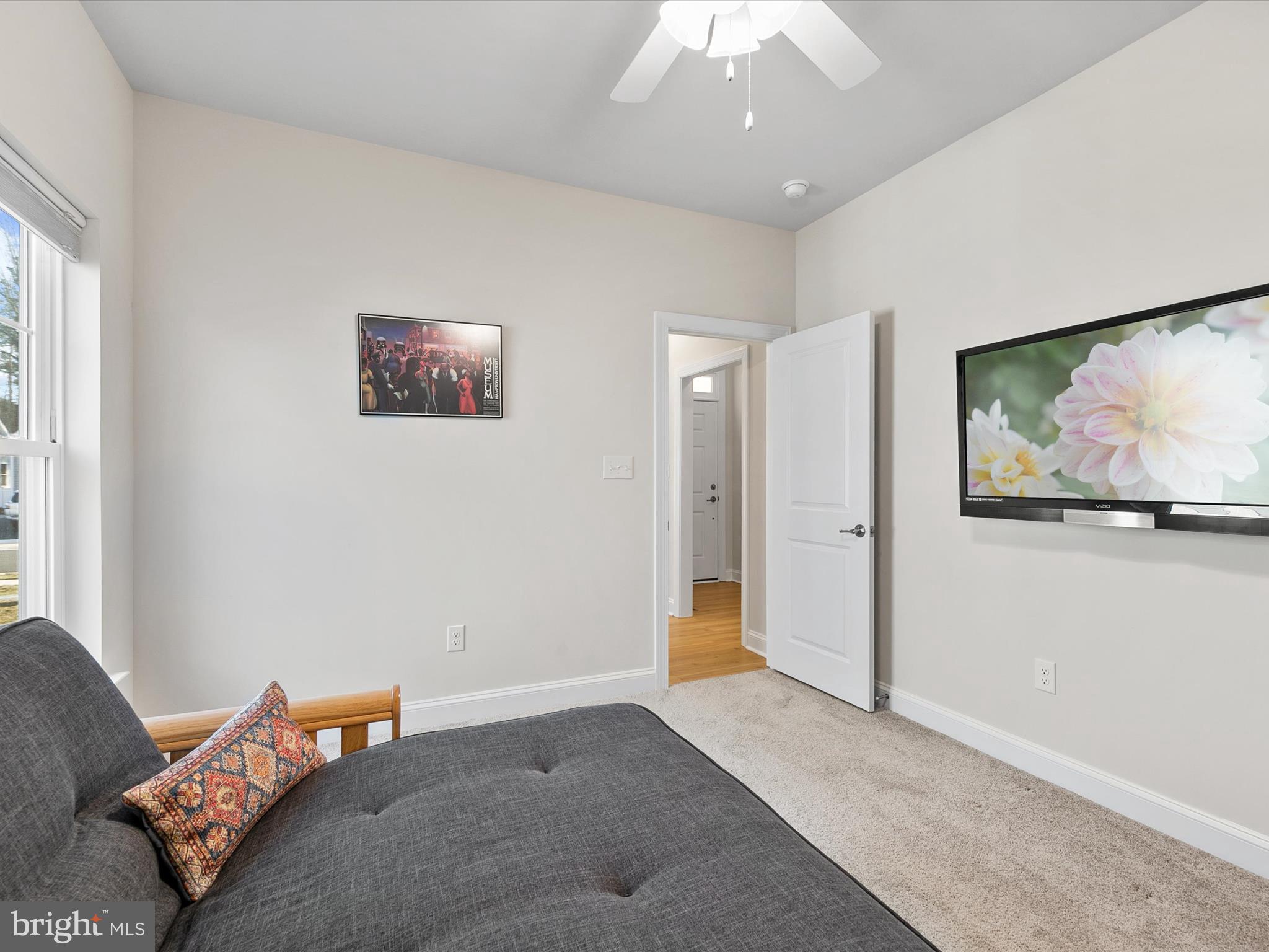 22657 Deep Woods Road Milton, DE 19968 - Photo 26 of 51 a bedroom with furniture and a window
