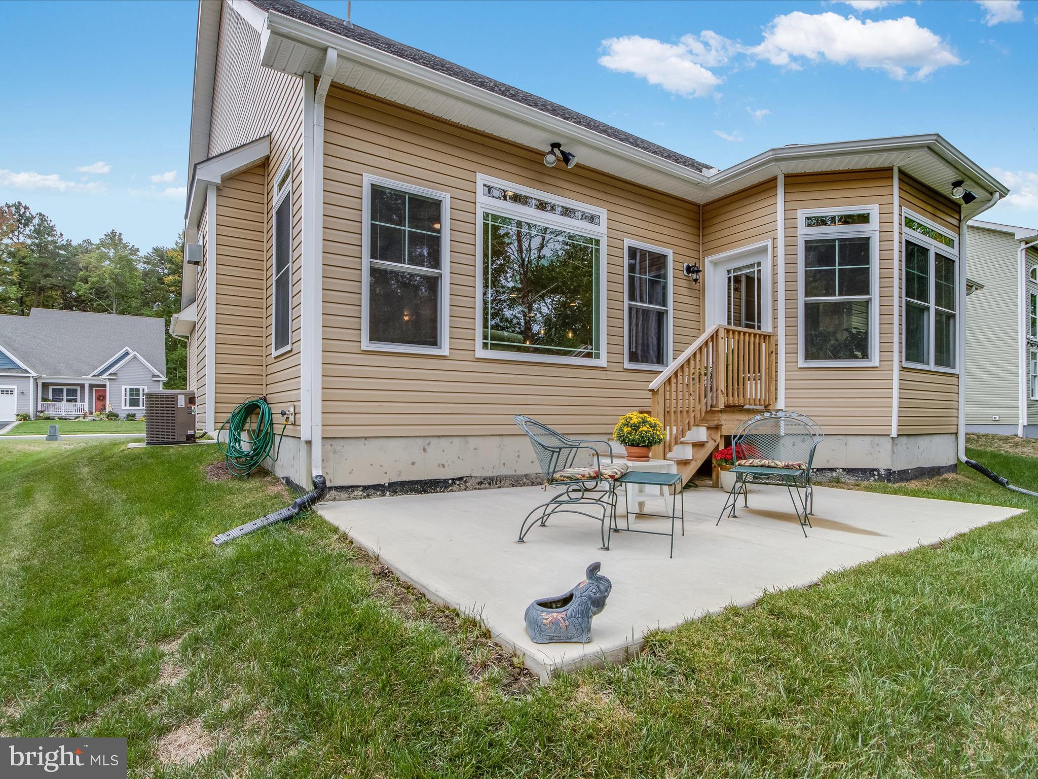 22657 Deep Woods Road Milton, DE 19968 - Photo 33 of 51 a view of a house with backyard and sitting area