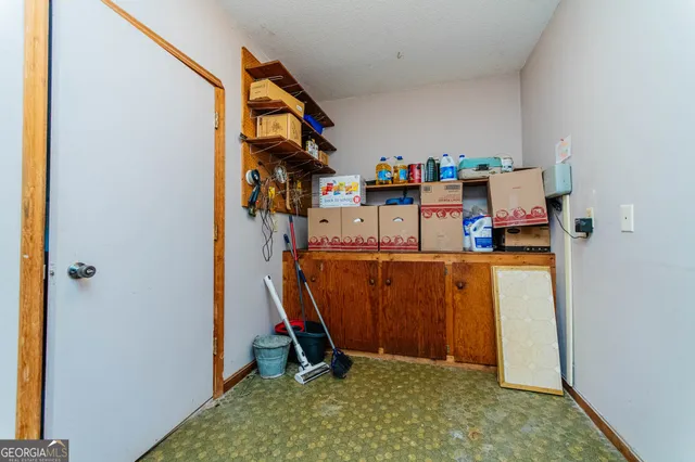 a room with storage and utility