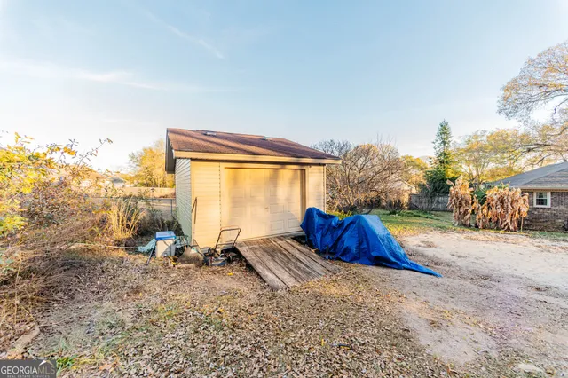 a view of backyard with green space