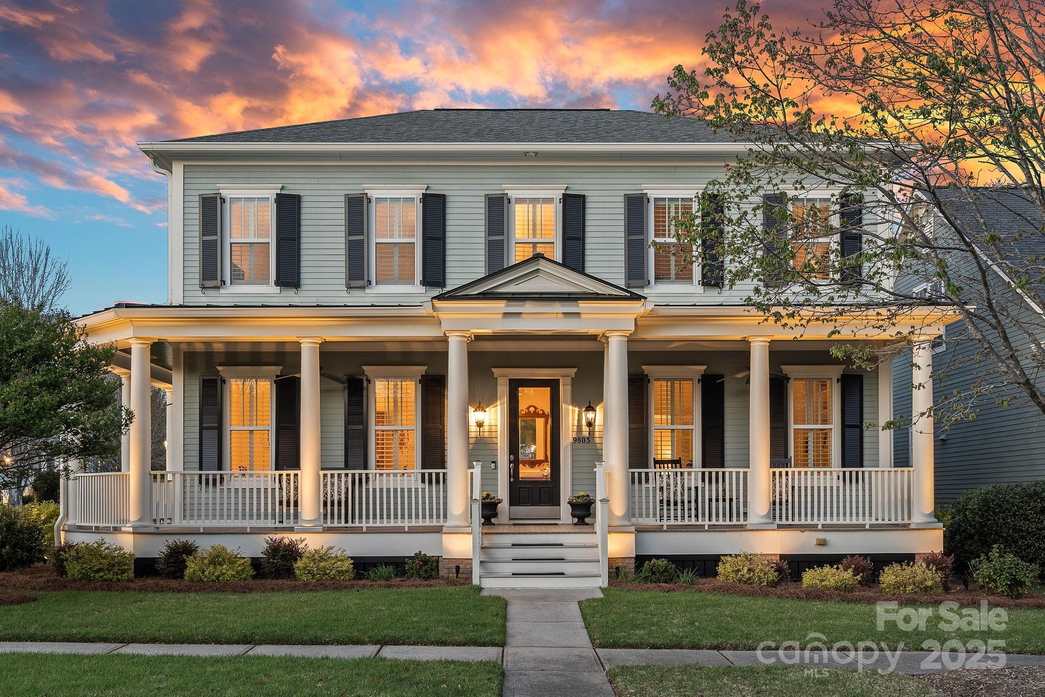9803 Tree Canopy Road Charlotte, NC 28277 - Photo 1 of 42 a front view of a house with a yard
