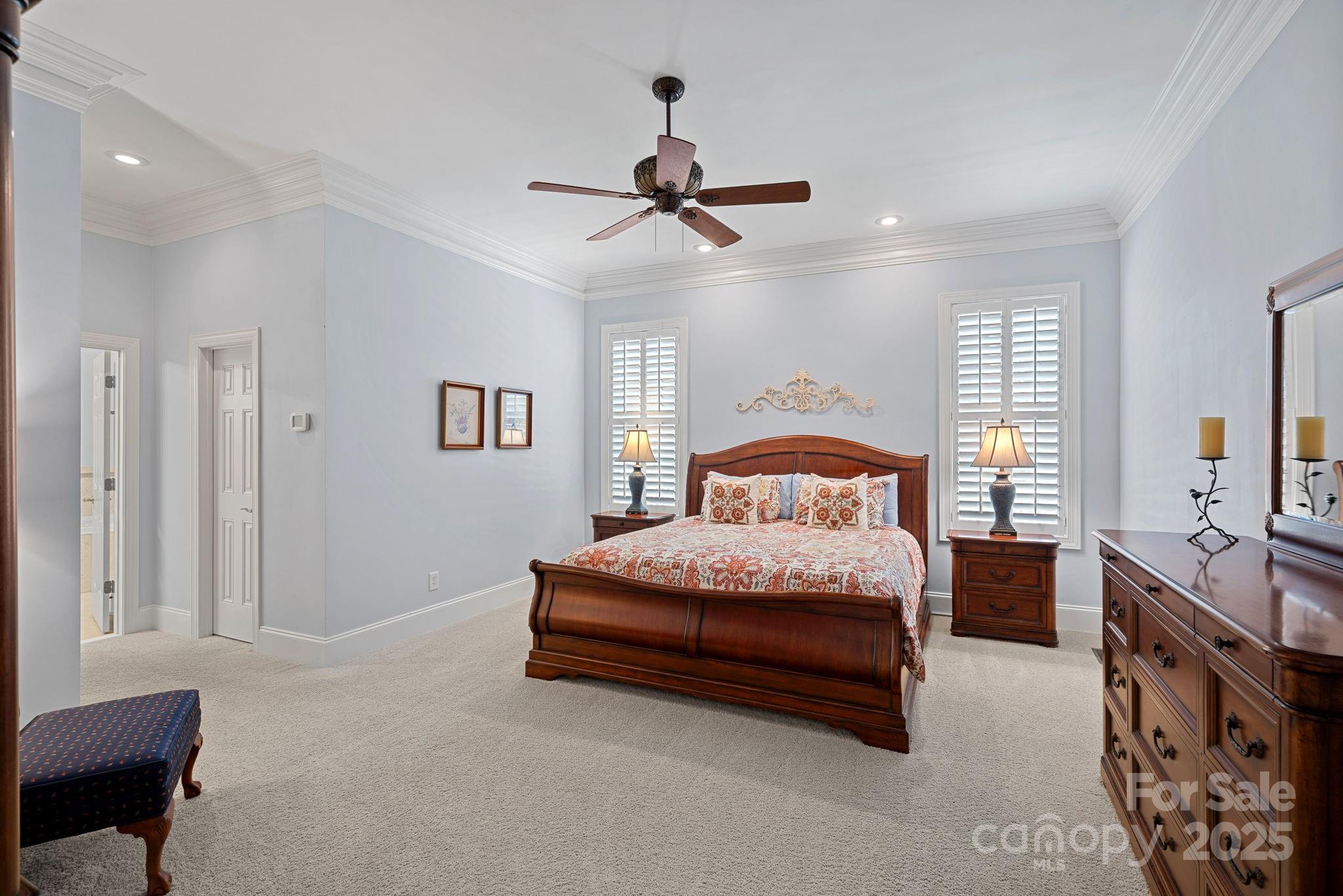 9803 Tree Canopy Road Charlotte, NC 28277 - Photo 12 of 42 a bedroom with a bed dresser and a window
