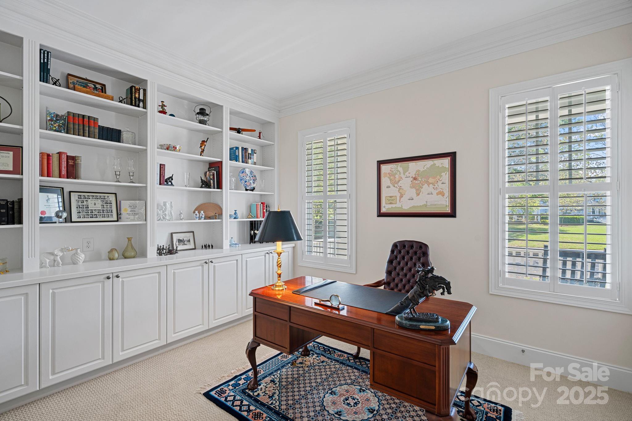 9803 Tree Canopy Road Charlotte, NC 28277 - Photo 17 of 42 a view of a workspace with furniture and a window