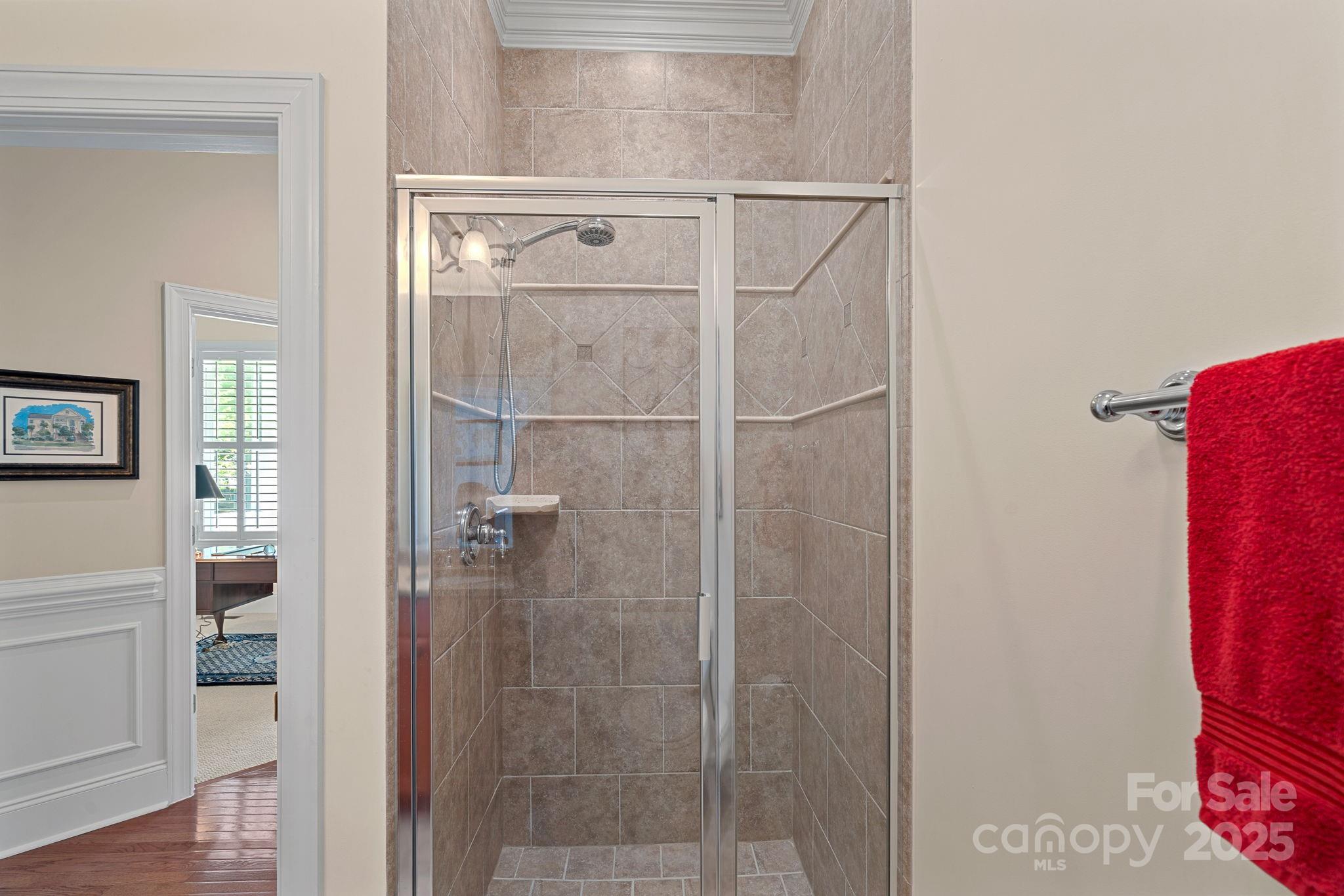 9803 Tree Canopy Road Charlotte, NC 28277 - Photo 19 of 42 a bathroom with a shower