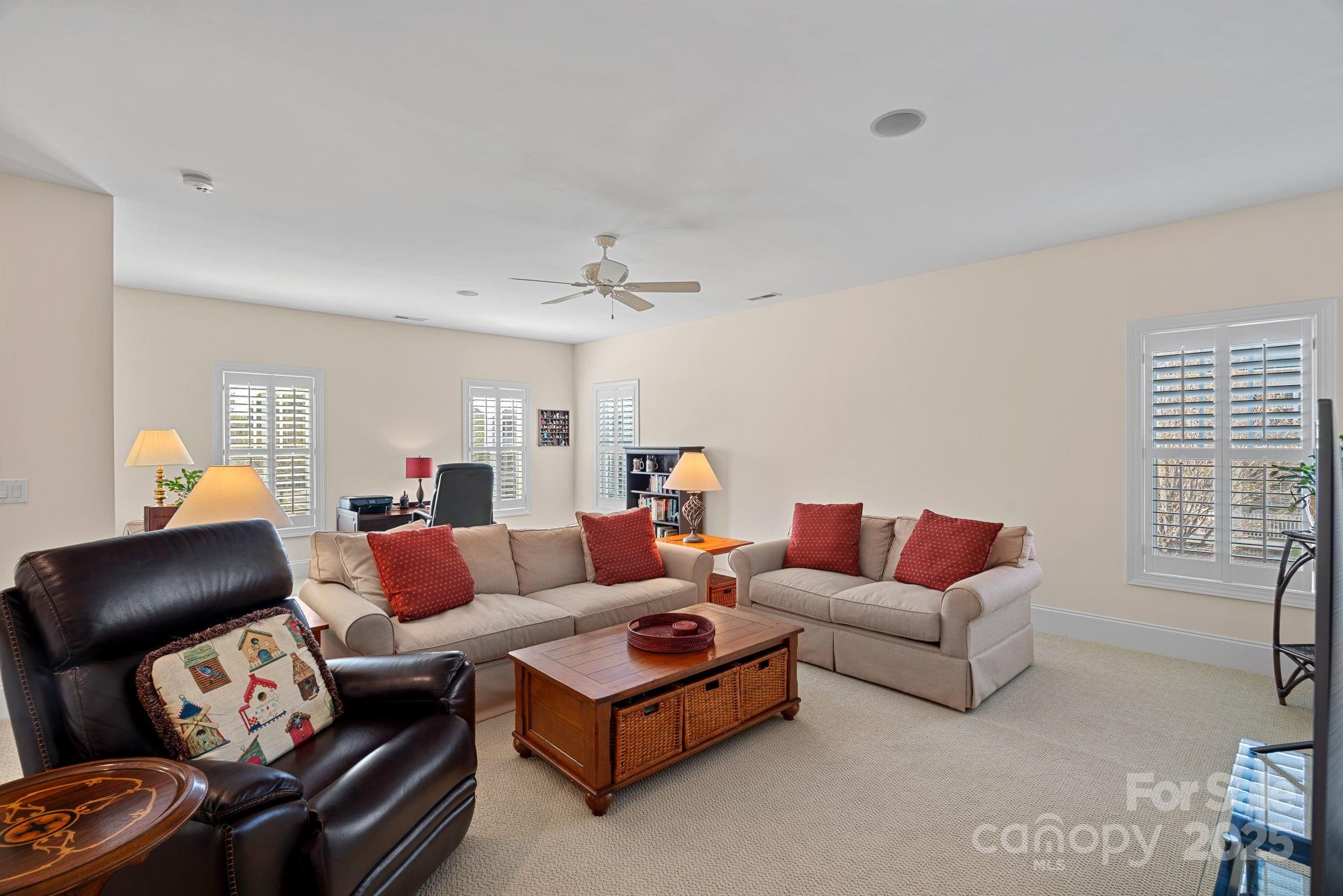 9803 Tree Canopy Road Charlotte, NC 28277 - Photo 22 of 42 a living room with furniture and a window